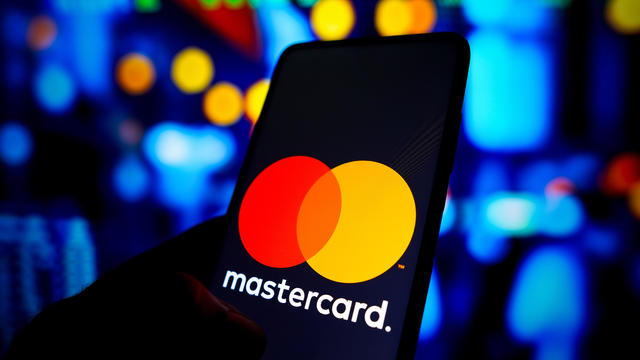 In this photo illustration the Mastercard logo seen 